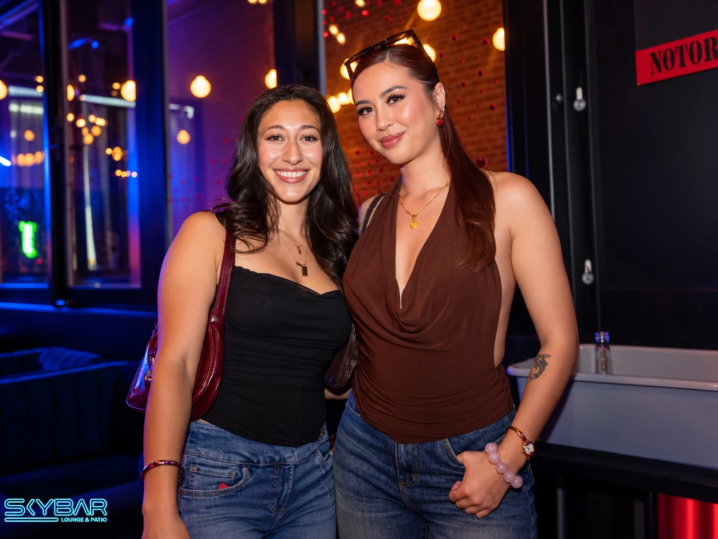 Guests sharing a nightlife moment at Skybar